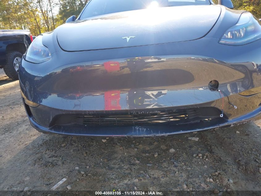 2023 Tesla Model Y Awd/Long Range Dual Motor All-Wheel Drive VIN: 7SAYGDEE5PA188729 Lot: 40883105