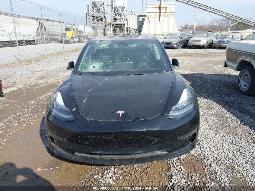 2018 Tesla Model 3 VIN: 5YJ3E1EA7JF018777 Lot: 40883372