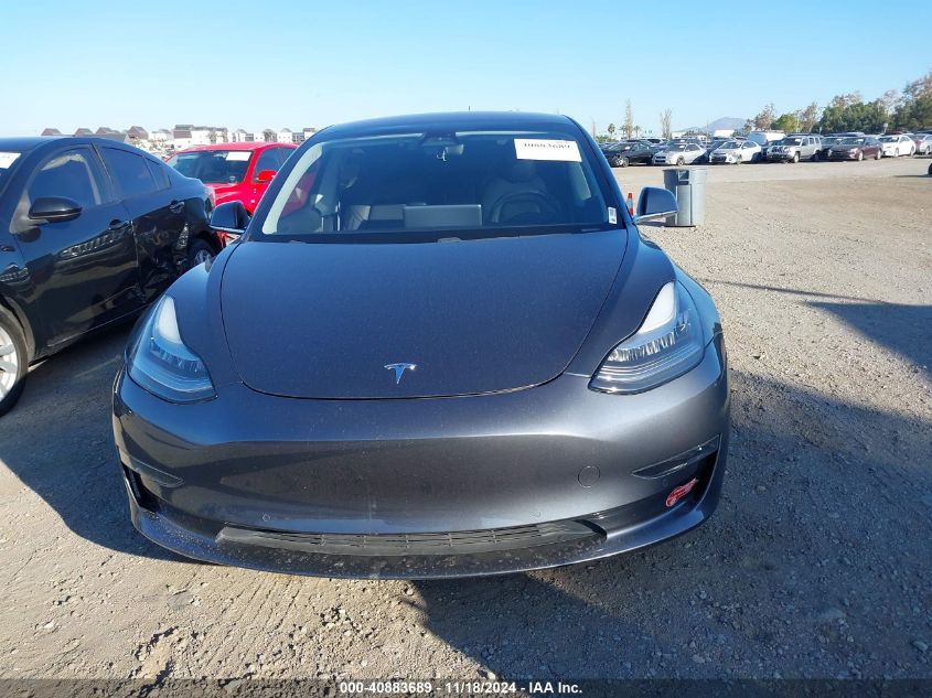 2018 Tesla Model 3 Long Range/Mid Range VIN: 5YJ3E1EA6JF051656 Lot: 40883689