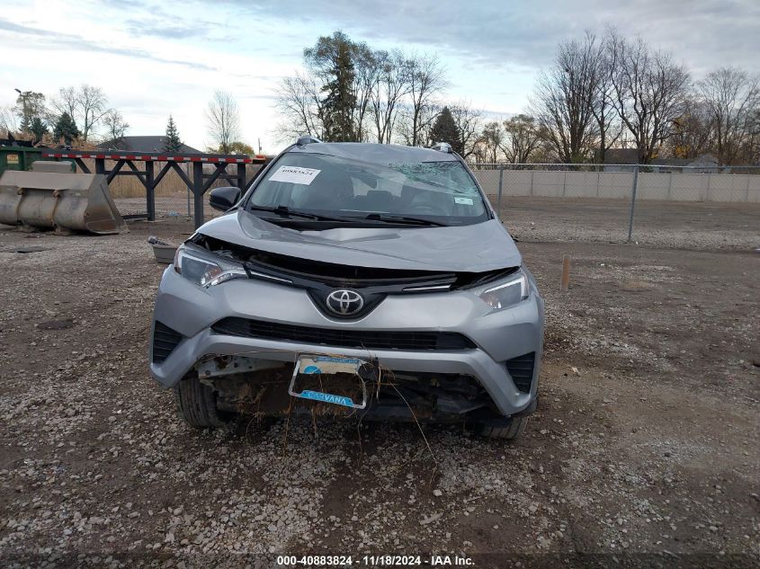 2018 Toyota Rav4 Le VIN: 2T3BFREV6JW721534 Lot: 40883824