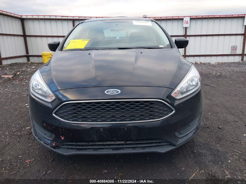 2018 Ford Focus Se VIN: 1FADP3FE7JL231128 Lot: 40884305