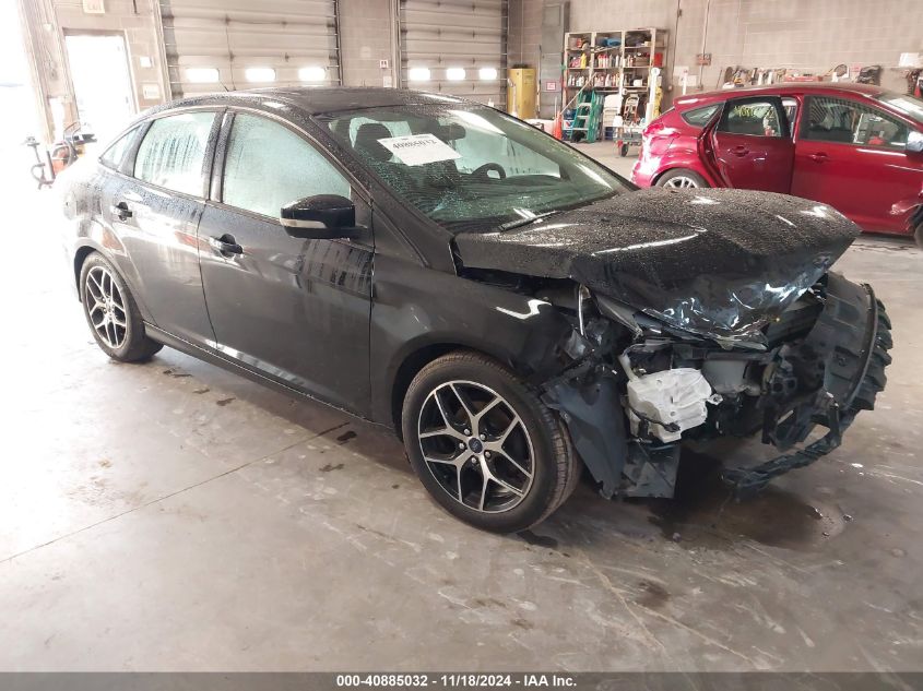 VIN 1FADP3H2XHL306773 2017 FORD FOCUS no.1