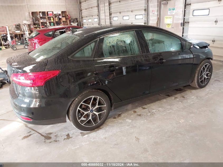 VIN 1FADP3H2XHL306773 2017 FORD FOCUS no.4