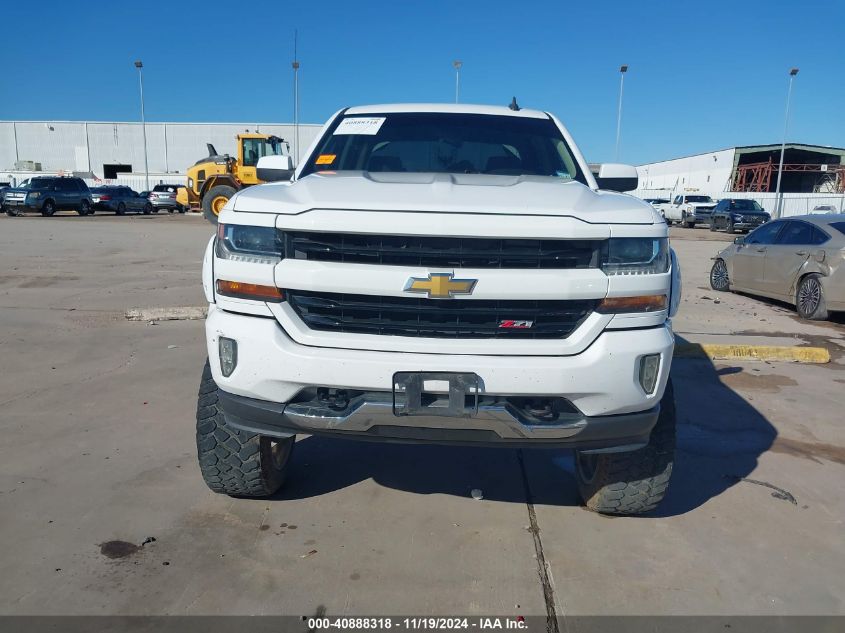 2018 Chevrolet Silverado 1500 2Lt VIN: 3GCUKREC7JG303843 Lot: 40888318