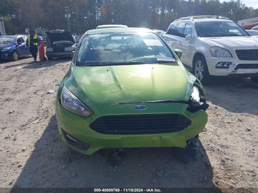 2018 Ford Focus Se VIN: 1FADP3FE4JL255497 Lot: 40889769