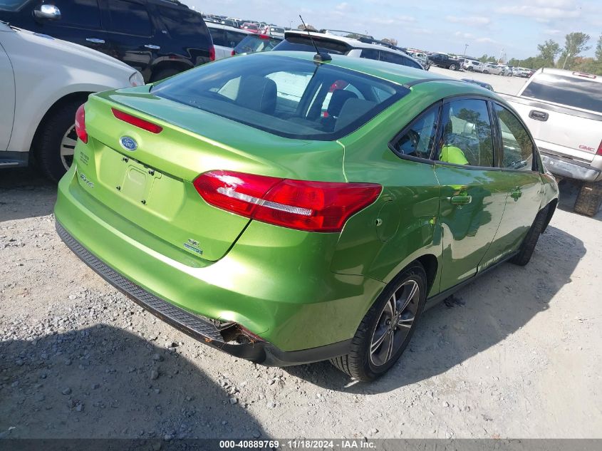 VIN 1FADP3FE4JL255497 2018 Ford Focus, SE no.4