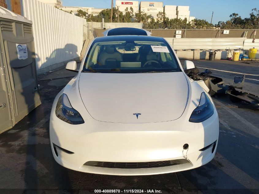 2023 Tesla Model Y Awd/Long Range Dual Motor All-Wheel Drive VIN: 7SAYGAEEXPF699113 Lot: 40889870