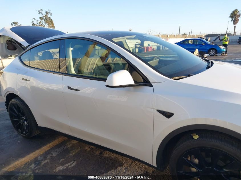 2023 Tesla Model Y Awd/Long Range Dual Motor All-Wheel Drive VIN: 7SAYGAEEXPF699113 Lot: 40889870