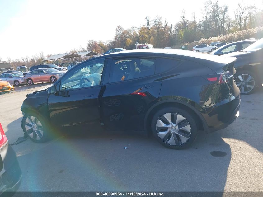 2023 Tesla Model Y Awd/Long Range Dual Motor All-Wheel Drive VIN: 7SAYGDEE8PA177580 Lot: 40890954