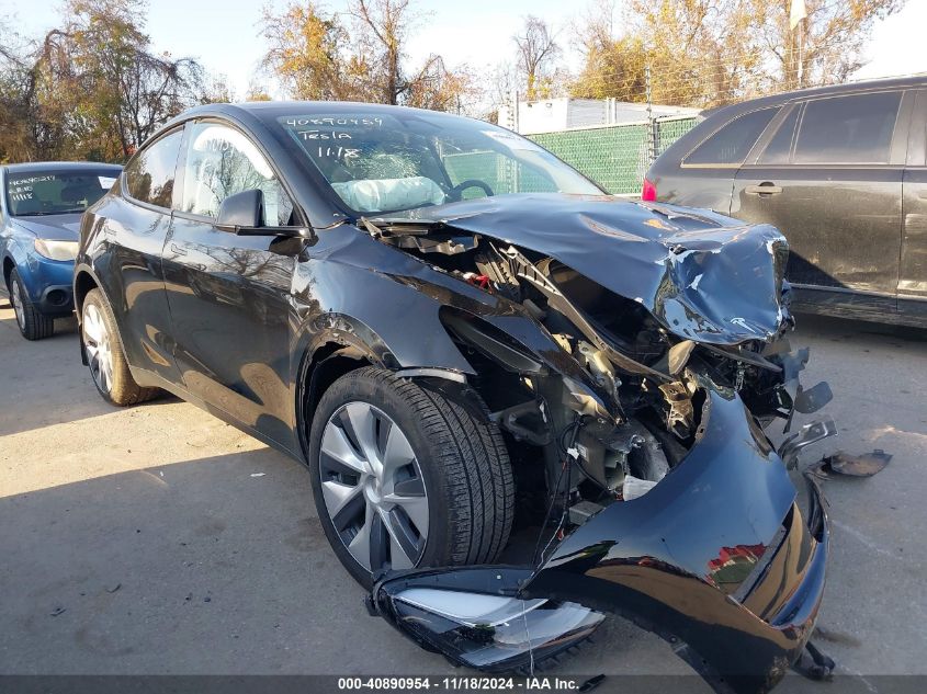 2023 Tesla Model Y Awd/Long Range Dual Motor All-Wheel Drive VIN: 7SAYGDEE8PA177580 Lot: 40890954