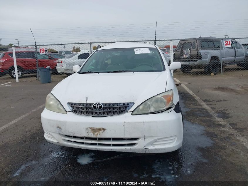 2002 Toyota Camry Le VIN: 4T1BE32KX2U106327 Lot: 40891748