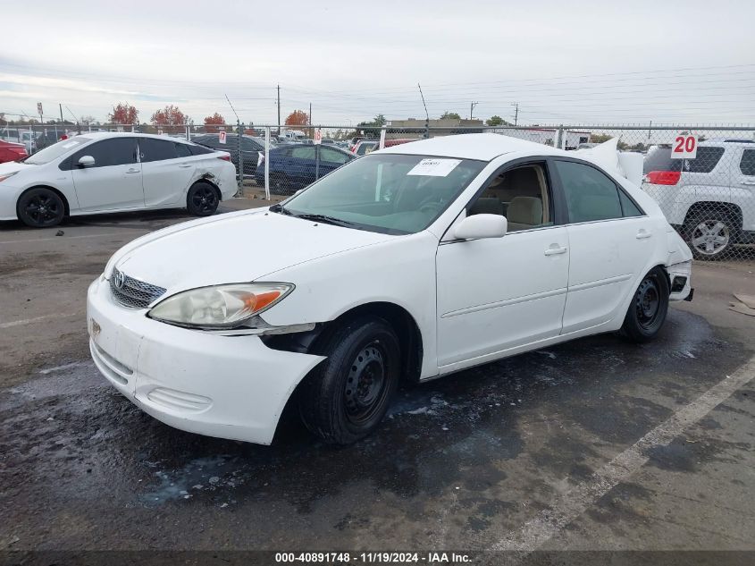 2002 Toyota Camry Le VIN: 4T1BE32KX2U106327 Lot: 40891748