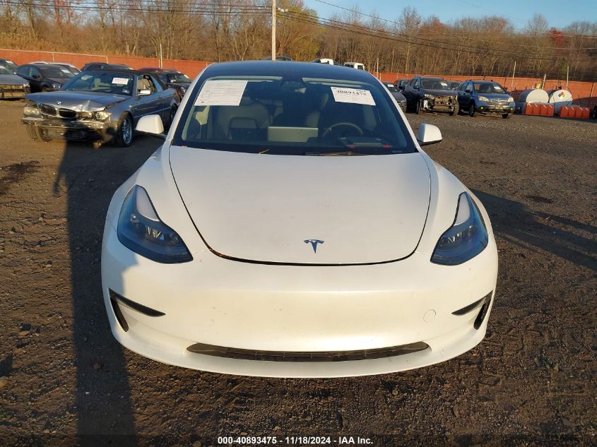 2023 Tesla Model 3 Long Range Dual Motor All-Wheel Drive VIN: 5YJ3E1EB8PF604938 Lot: 40893475