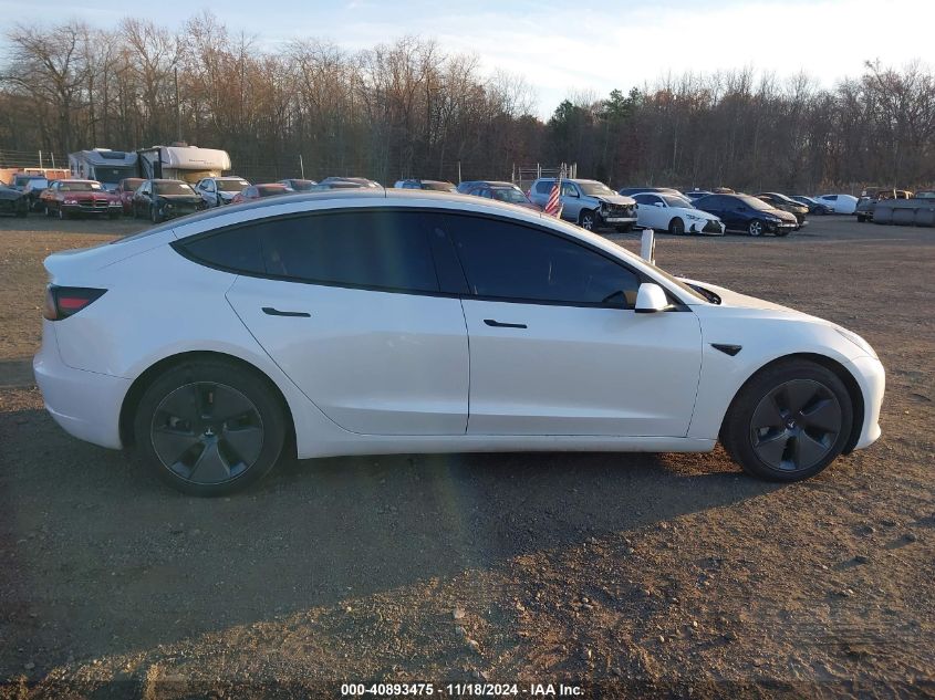 2023 Tesla Model 3 Long Range Dual Motor All-Wheel Drive VIN: 5YJ3E1EB8PF604938 Lot: 40893475