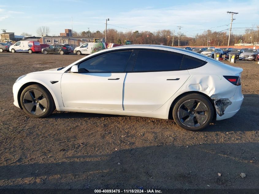 2023 Tesla Model 3 Long Range Dual Motor All-Wheel Drive VIN: 5YJ3E1EB8PF604938 Lot: 40893475