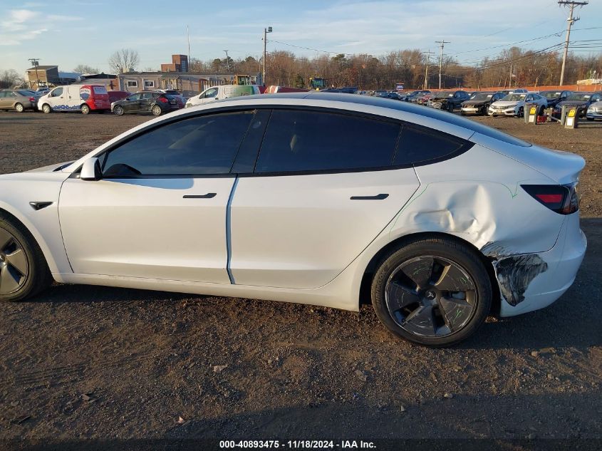 2023 Tesla Model 3 Long Range Dual Motor All-Wheel Drive VIN: 5YJ3E1EB8PF604938 Lot: 40893475