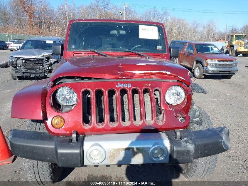 2009 Jeep Wrangler Unlimited Sahara VIN: 1J8GA59189L773646 Lot: 40895110