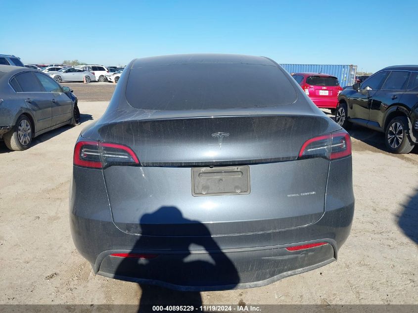 2023 Tesla Model Y Awd/Long Range Dual Motor All-Wheel Drive VIN: 7SAYGDEE9PA203264 Lot: 40895229