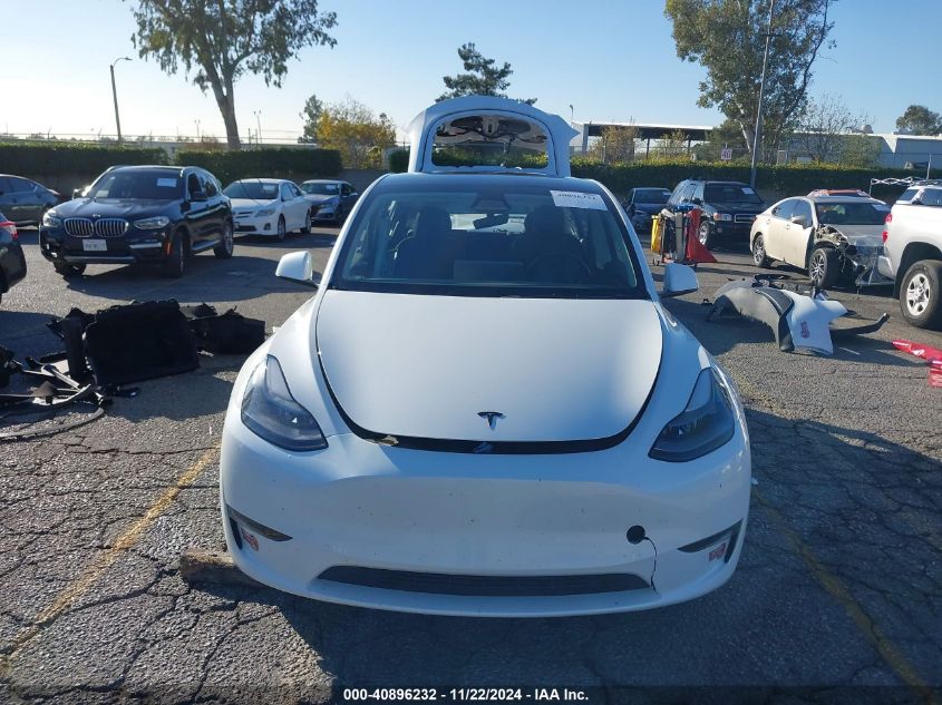 2023 Tesla Model Y Awd/Long Range Dual Motor All-Wheel Drive VIN: 7SAYGDEEXPF896297 Lot: 40896232