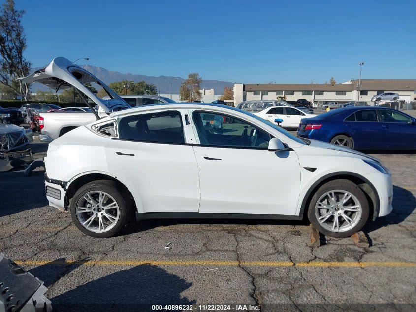 2023 Tesla Model Y Awd/Long Range Dual Motor All-Wheel Drive VIN: 7SAYGDEEXPF896297 Lot: 40896232