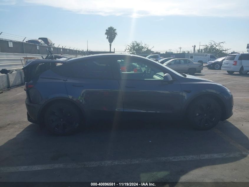 2023 Tesla Model Y Awd/Long Range Dual Motor All-Wheel Drive VIN: 7SAYGAEE8PF623860 Lot: 40896581