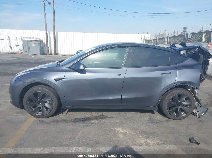 2023 Tesla Model Y Awd/Long Range Dual Motor All-Wheel Drive VIN: 7SAYGAEE8PF623860 Lot: 40896581