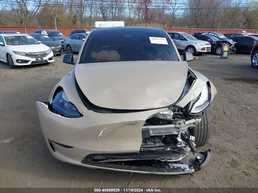 2023 Tesla Model Y Awd/Long Range Dual Motor All-Wheel Drive VIN: 7SAYGDEE7PF746437 Lot: 40899929