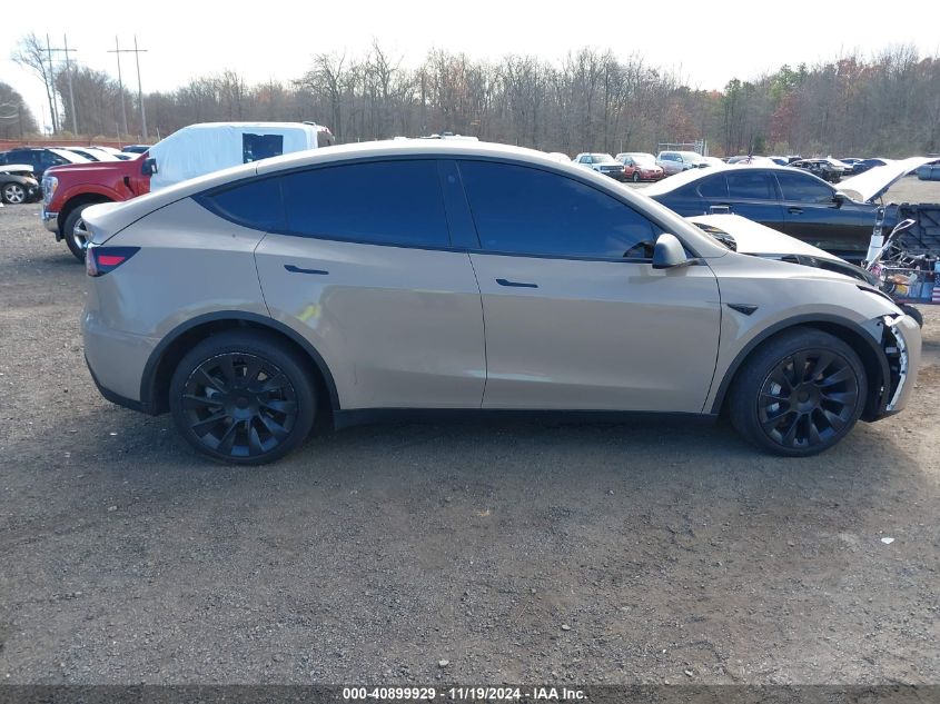 2023 Tesla Model Y Awd/Long Range Dual Motor All-Wheel Drive VIN: 7SAYGDEE7PF746437 Lot: 40899929