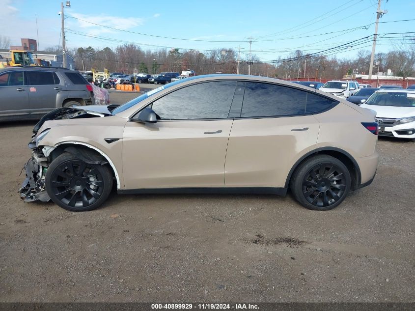 2023 Tesla Model Y Awd/Long Range Dual Motor All-Wheel Drive VIN: 7SAYGDEE7PF746437 Lot: 40899929