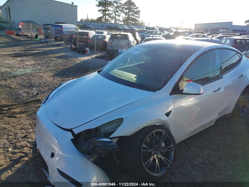 2024 Tesla Model Y Long Range Dual Motor All-Wheel Drive VIN: 7SAYGAEE7RF114717 Lot: 40901946