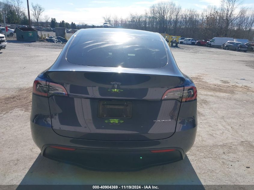 2023 Tesla Model Y Awd/Long Range Dual Motor All-Wheel Drive VIN: 7SAYGAEE1PF674004 Lot: 40904369