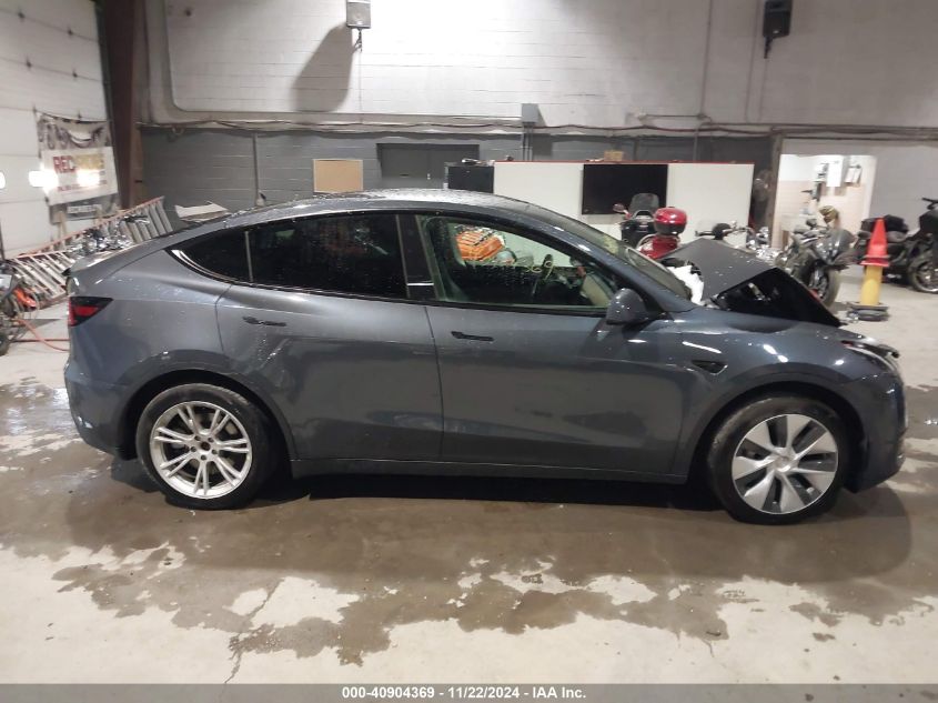 2023 Tesla Model Y Awd/Long Range Dual Motor All-Wheel Drive VIN: 7SAYGAEE1PF674004 Lot: 40904369