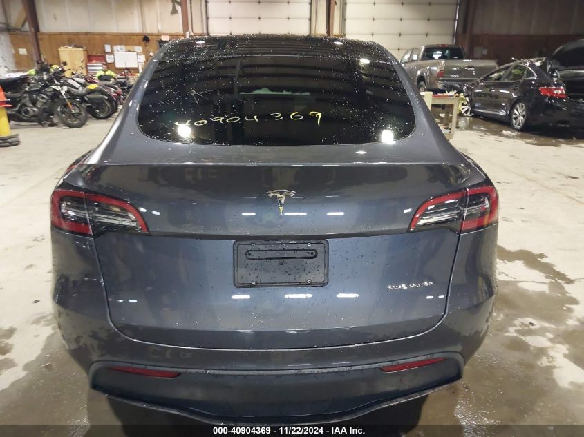 2023 Tesla Model Y Awd/Long Range Dual Motor All-Wheel Drive VIN: 7SAYGAEE1PF674004 Lot: 40904369