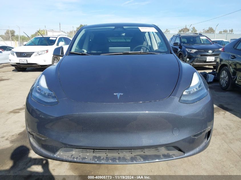 2023 Tesla Model Y Awd/Long Range Dual Motor All-Wheel Drive VIN: 7SAYGDEE1PA137017 Lot: 40905773