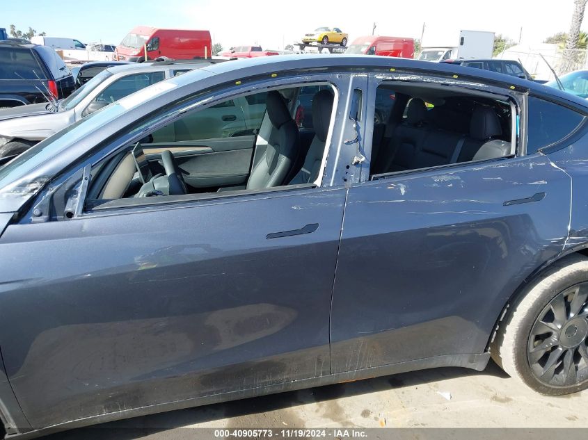 2023 Tesla Model Y Awd/Long Range Dual Motor All-Wheel Drive VIN: 7SAYGDEE1PA137017 Lot: 40905773