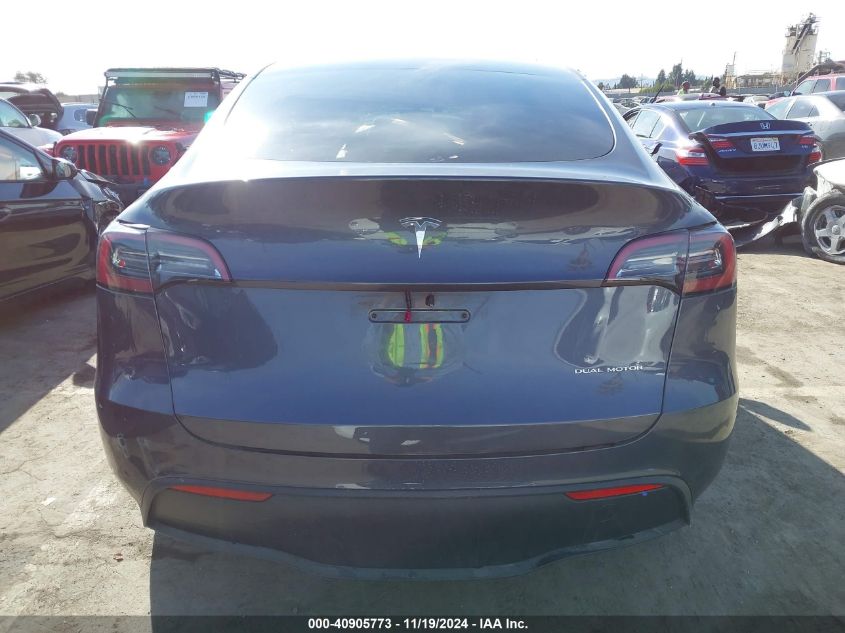 2023 Tesla Model Y Awd/Long Range Dual Motor All-Wheel Drive VIN: 7SAYGDEE1PA137017 Lot: 40905773