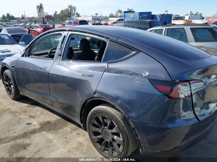 2023 Tesla Model Y Awd/Long Range Dual Motor All-Wheel Drive VIN: 7SAYGDEE1PA137017 Lot: 40905773