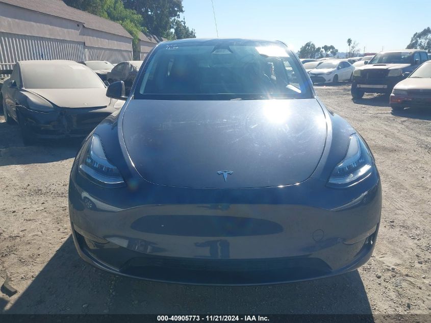 2023 Tesla Model Y Awd/Long Range Dual Motor All-Wheel Drive VIN: 7SAYGDEE1PA137017 Lot: 40905773