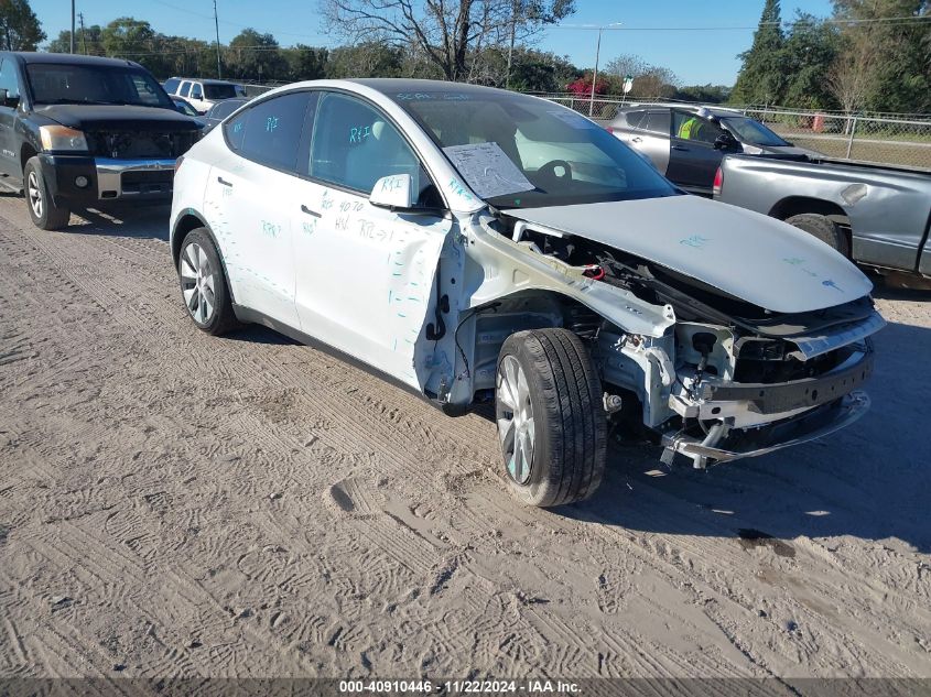 2023 Tesla Model Y Rwd VIN: 7SAYGDED0PF967658 Lot: 40910446