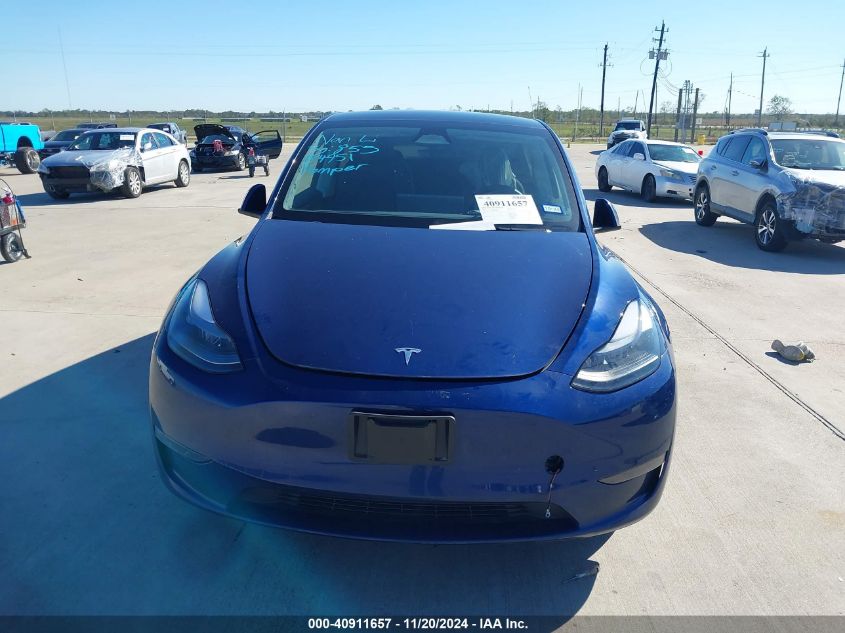 2023 Tesla Model Y Awd/Long Range Dual Motor All-Wheel Drive VIN: 7SAYGDEE9PF884951 Lot: 40911657