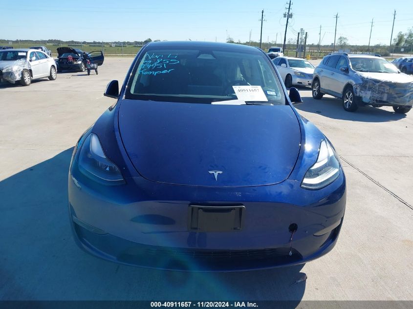 2023 Tesla Model Y Awd/Long Range Dual Motor All-Wheel Drive VIN: 7SAYGDEE9PF884951 Lot: 40911657