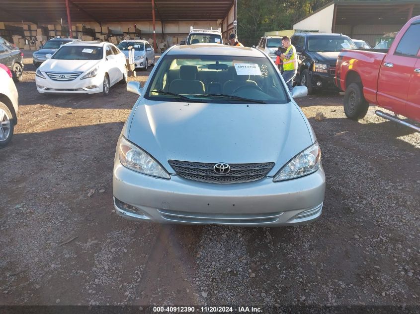 2004 Toyota Camry Le VIN: JTDBE32K740262310 Lot: 40912390