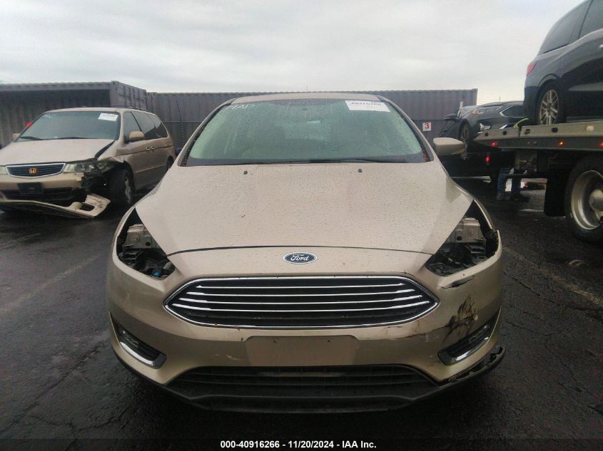 2017 Ford Focus Titanium VIN: 1FADP3N22HL272686 Lot: 40916266