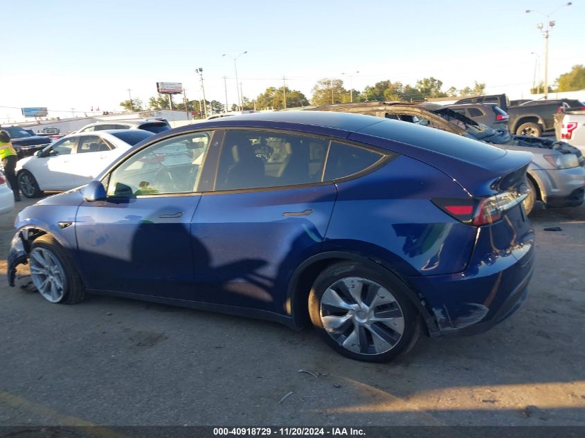 2023 Tesla Model Y Awd/Long Range Dual Motor All-Wheel Drive VIN: 7SAYGDEE0PA076517 Lot: 40918729