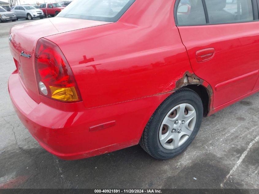 2005 Hyundai Accent Gls VIN: KMHCG45C05U601195 Lot: 40921591