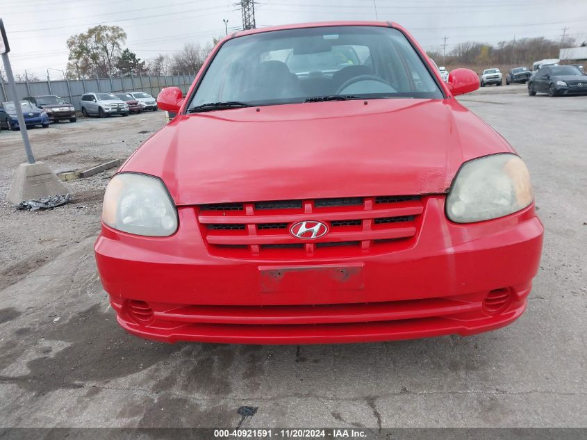 2005 Hyundai Accent Gls VIN: KMHCG45C05U601195 Lot: 40921591