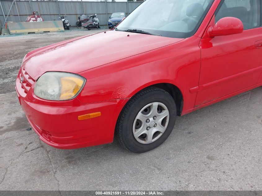 2005 Hyundai Accent Gls VIN: KMHCG45C05U601195 Lot: 40921591