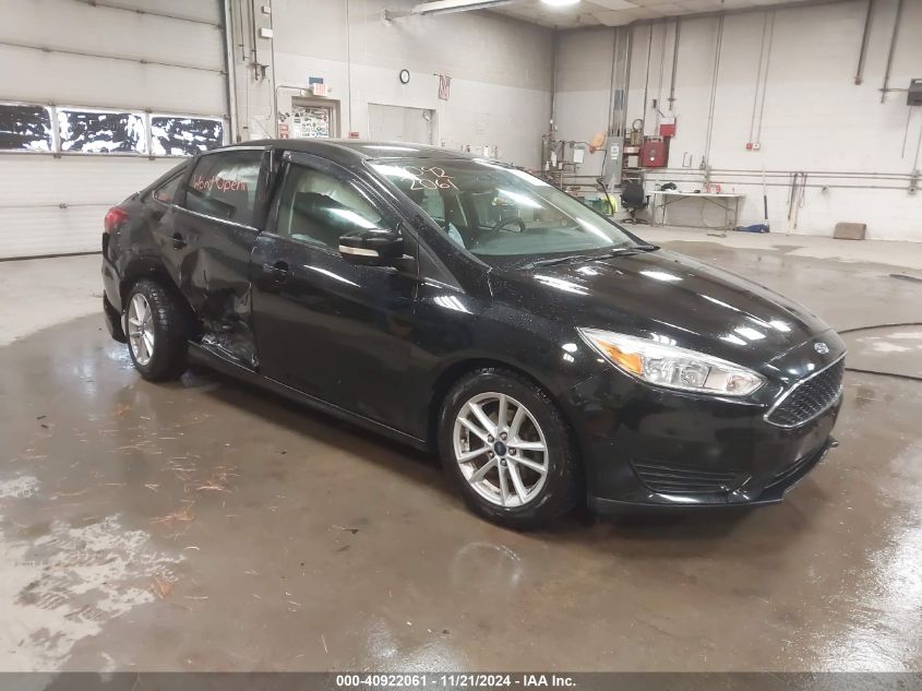 VIN 1FADP3F20HL265928 2017 FORD FOCUS no.1