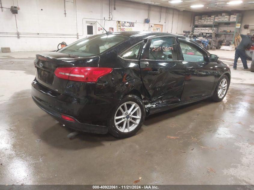 VIN 1FADP3F20HL265928 2017 FORD FOCUS no.4