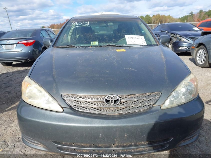 2002 Toyota Camry Le VIN: 4T1BE32K12U090180 Lot: 40922873